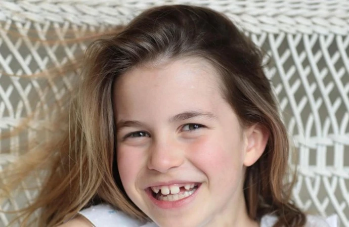 Princess Charlotte beams on her eighth birthday