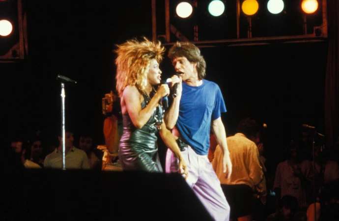 Tina Turner was "prepared" for Sir Mick Jagger to tear off her skirt at Live Aid