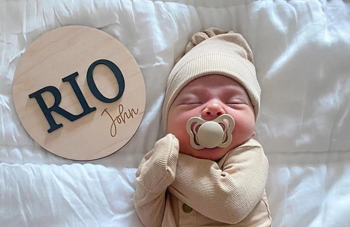 Peta Murgatroyd and Maks Chmerkovskiy  share a photo of their baby Rio John