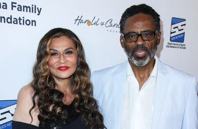 Tina Knowles and Richard Lawson have agreed to divide their assets and part ways 'amicably'