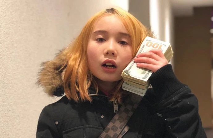 Lil Tay's former manager has spoken out