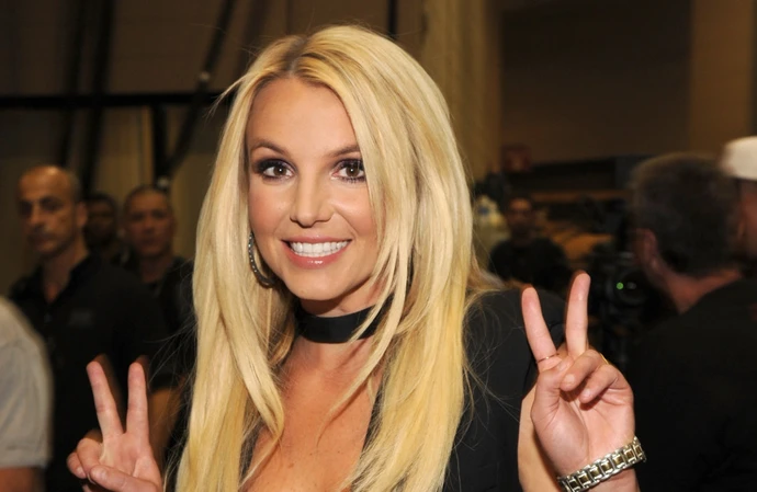 Britney Spears has hinted at 'darker' events