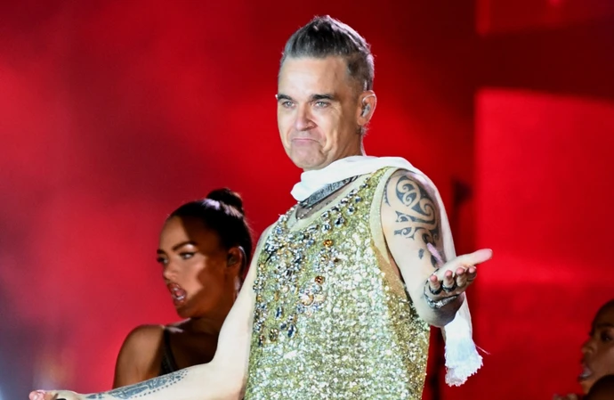 Robbie Williams making rock album featuring Tony Iommi and Gaz Coombes