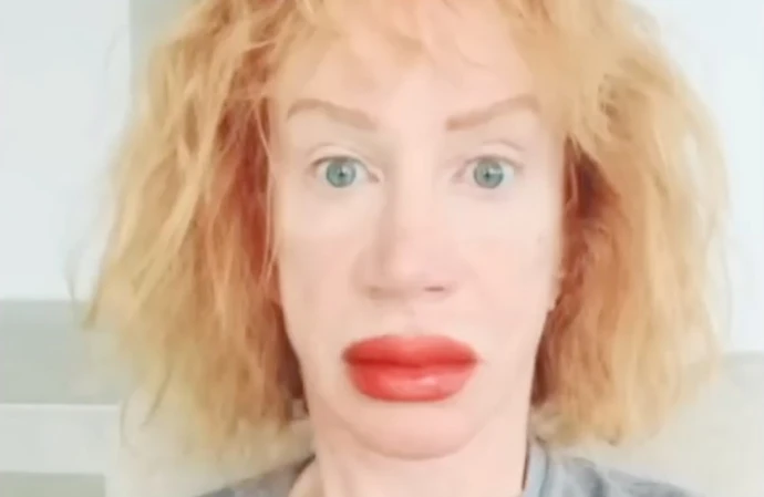 Kathy Griffin has stunned fans by showing off the swollen results of getting her lips tattooed red
