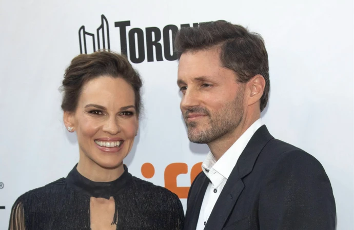 Hilary Swank and Philip Schneider