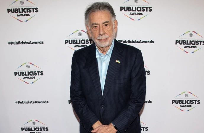 Francis Ford Coppola is being defended against claims he tried to kiss topless female extras while on the set of his upcoming sci-fi epic