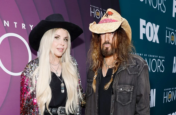 Billy Ray Cyrus is at odds with his estranged wife Firerose