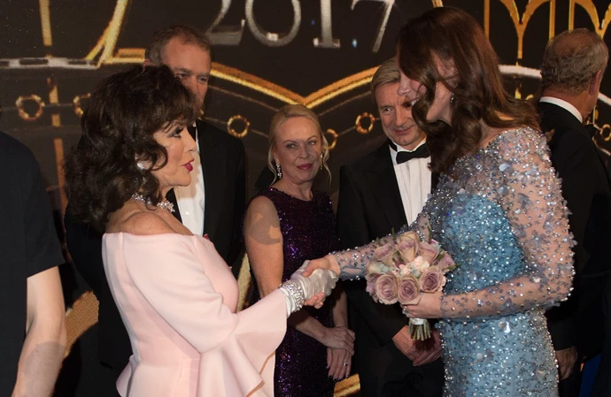 Joan Collins forgot to curtsy and 'gulped' in front of the royal