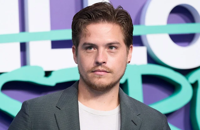 Dylan Sprouse held the intruder at gunpoint