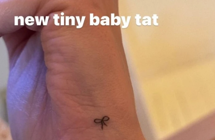 Hailey Bieber has added to her tattoo collection with a ‘tiny baby’ inking