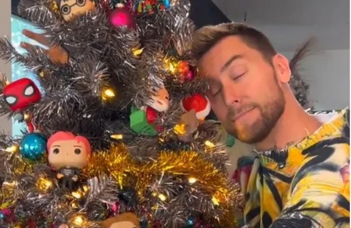 Lance Bass puts up 35 Christmas trees every year