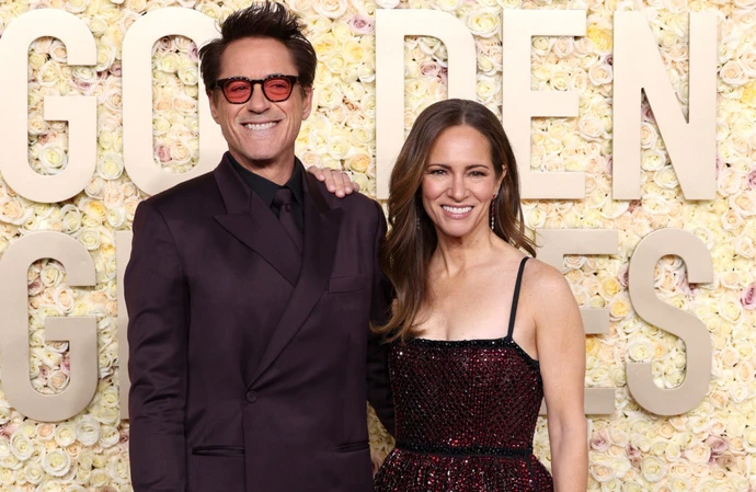 Robert Downey Jr and his wife at the Golden Globe Awards