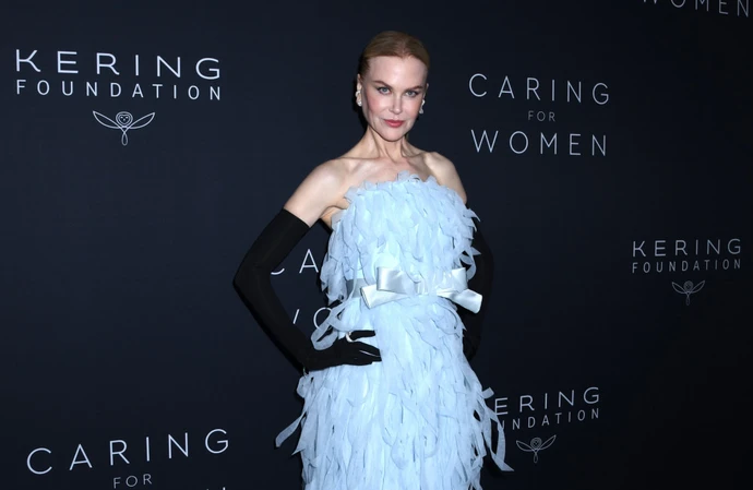 Nicole Kidman thinks slipping into different acting roles is similar to the life of a snake