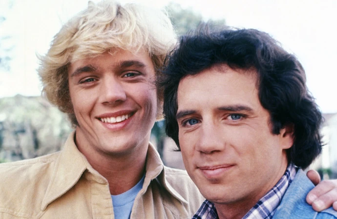 John Schneider and Tom Wopat first met in the bathroom 