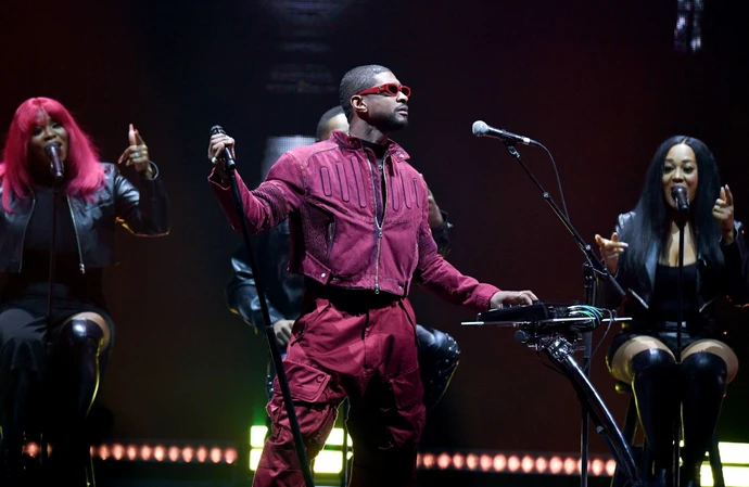 Usher has revealed the supergroup he was secretly in talks for