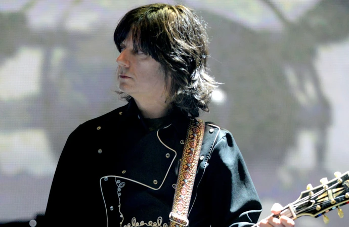 John Squire has revealed that The Stone Roses didn't want to make a new album