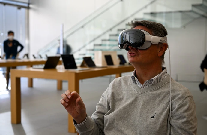 Apple has reportedly paused development on a revamped version of its Vision Pro headset to focus instead on AI-powered smart glasses