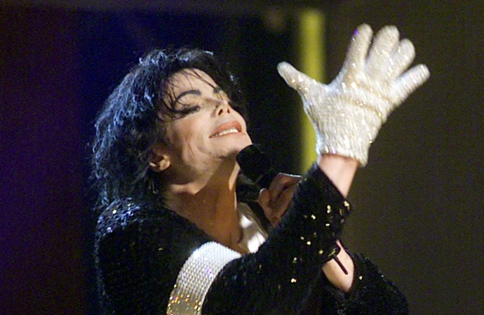 The director of Leaving Neverland has compared Michael Jackson's fanbase to a cult