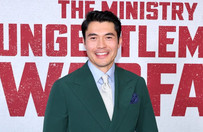Henry Golding has become curious about wellness retreats after making Nine Perfect Strangers
