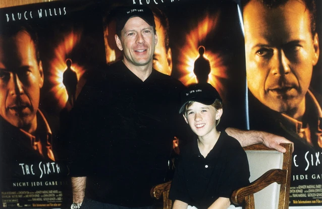 Haley Joel Osment says Bruce Willis dedicated so much time to helping his young co-star succeed in his role in 'The Sixth Sense'