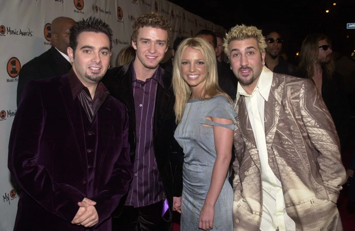 Chris Kirkpatrick (pictured with NSYNC bandmates Justin Timberlake and Joey Fatone) is willing to support his old friend Britney Spears