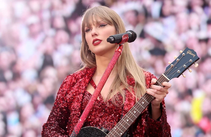 Taylor Swift performing at Wembley Stadium