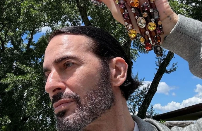 Marc Jacobs is loving his long nails