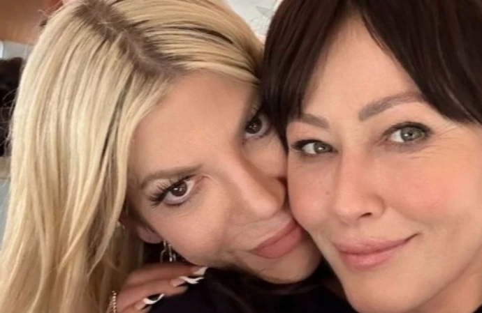 Tori Spelling has admitted it's 'hard' doing 'Dancing with the Stars' and grieving the loss of Shannen Doherty