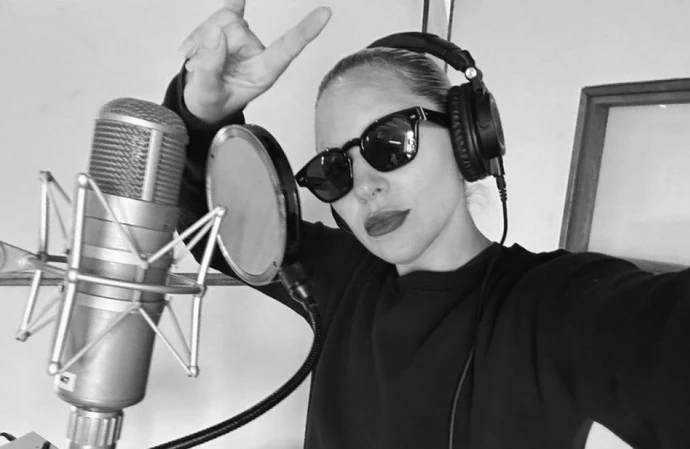 Could Lady Gaga be heading in a rock direction with her metal horns in her latest studio snap?