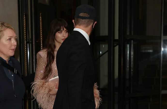 Dakota Johnson is still ‘happily together’ with Chris Martin