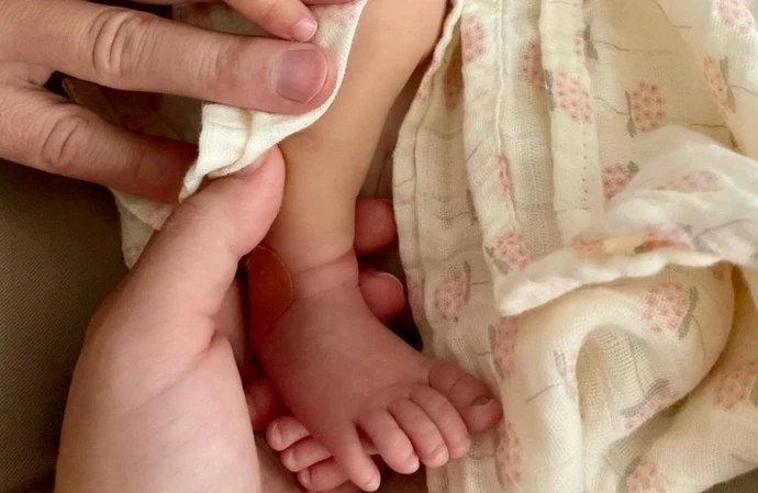 Lea Michele shared the first picture of her new baby girl