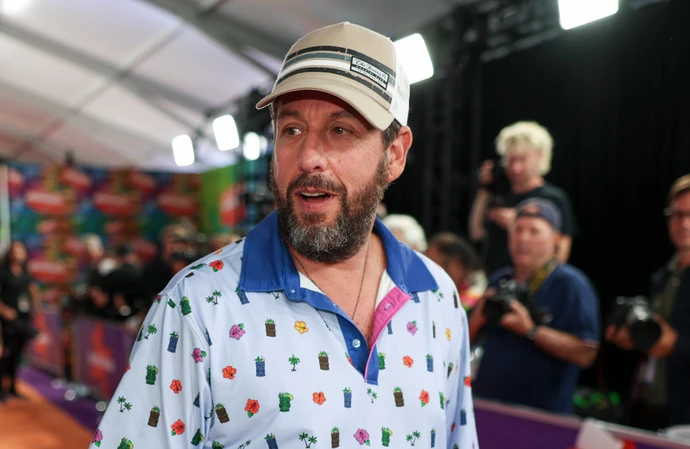 Adam Sandler gets mocked by his family for his 'goofy' style