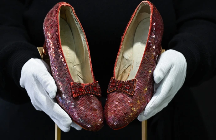 A pair of Judy Garland's ruby slippers have sold for $32.5 million