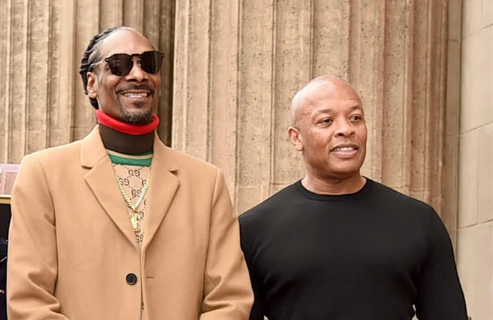 Snoop Dogg and Dre. Dre's sample of a charity song has made the organisation's year