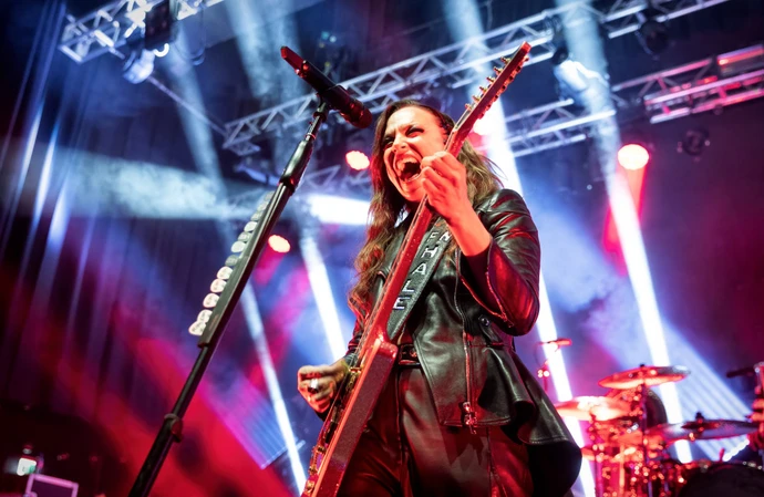 Lzzy Hale says her date falling asleep at a concert was a 'total deal-breaker'