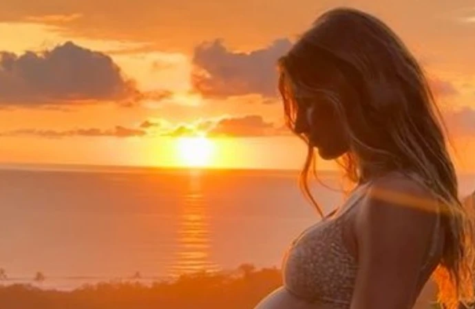 Gisele Bündchen has given fans a rare glimpse of her growing baby bump