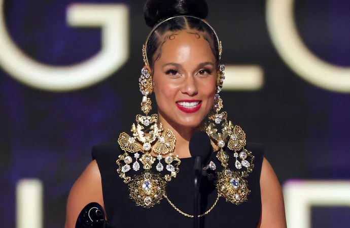 Alicia Keys with her award