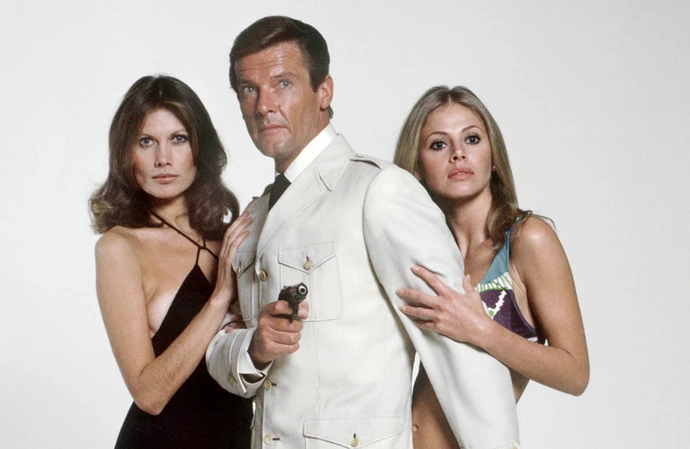 Roger Moore as James Bond with Maud Adams and Britt Ekland