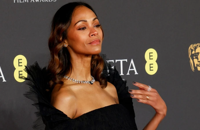 Zoe Saldana broke down in tears as she accepted the award for Best Supporting Actress at the EE BAFTAs