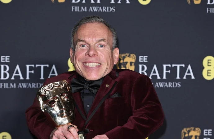 Warwick Davis became emotional as dedicated his BAFTA Fellowship Award to his late wife