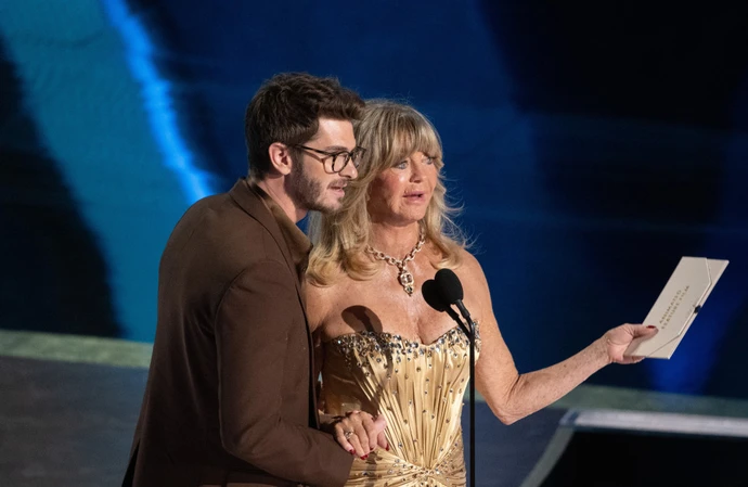 Goldie Hawn and Andrew Garfield onstage at the Oscars