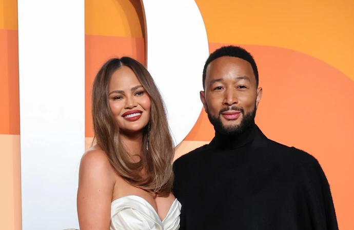 Chrissy Teigen and John Legend have adopted a dog