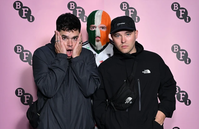 Kneecap star Mo Chara, right, has been charged with a terror offense