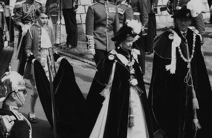Lord Charles O'Hagan carrying Queen Elizabeth's train in 1960