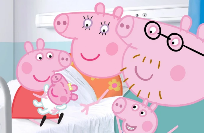 Daddy Pig became teary-eyed as he showed off his new piglet Evie