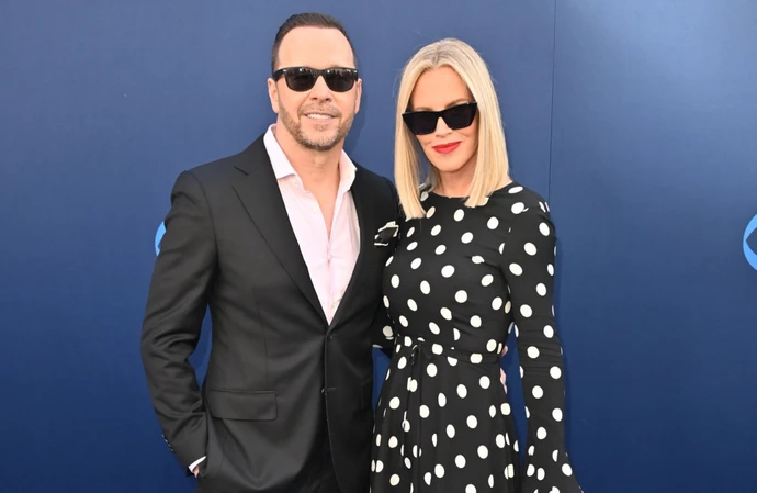 Jenny McCarthy has admitted she was 'too cool' to like husband Donnie Wahlberg's boy band New Kids on the Block in their heyday