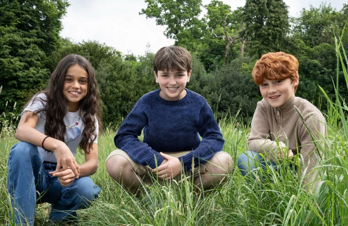 Dominic McLaughlin, middle, loved becoming Harry Potter for the first time