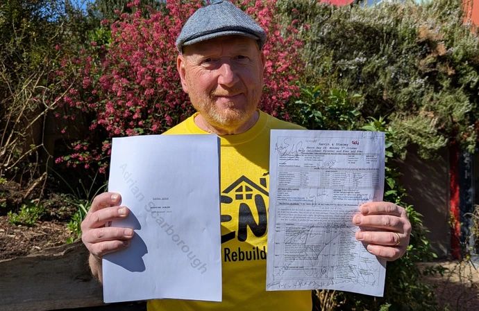 Adrian Scarborough holding his Gavin and Stacey: The Finale script and a signed call sheet from the episode's last scene / Credit: DENS