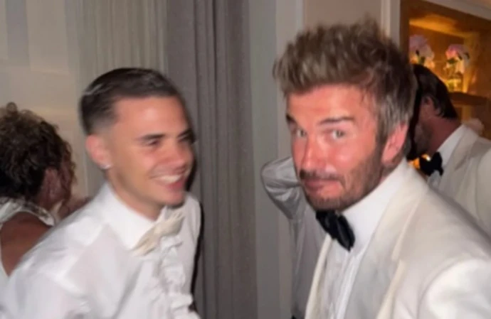 Romeo Beckham is 'so, so proud' of his dad David for receiving a knighthood