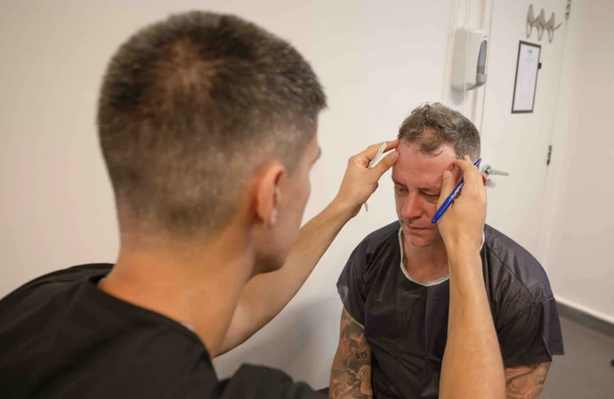 Wayne Bridge having his consultation at DHI Global